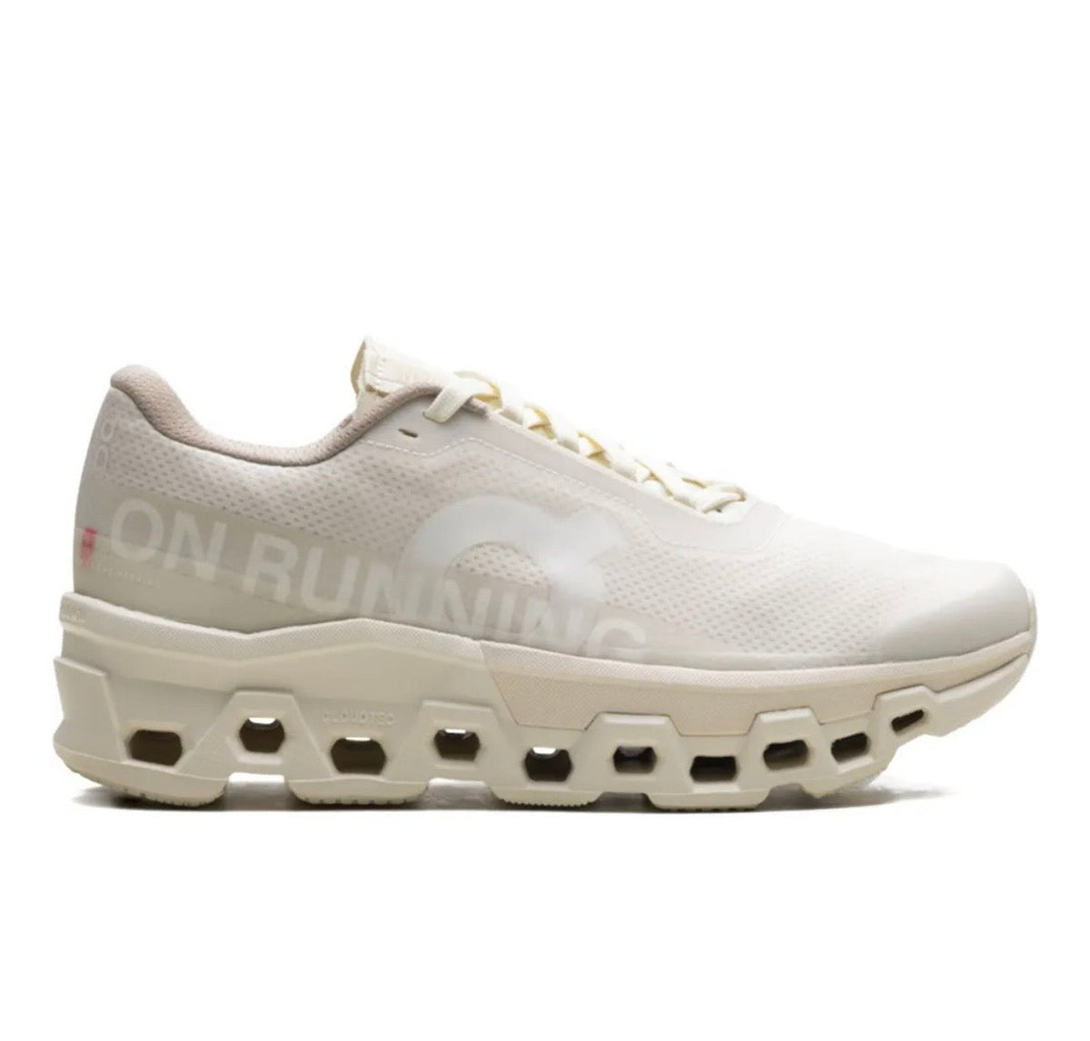 On Cloudmonster cream - high-performance athletic footwear with advanced cushioning