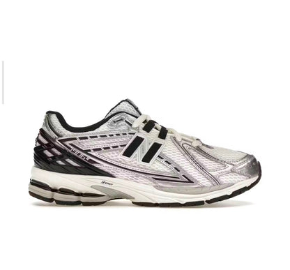 New Balance 1906R
Silver Black - high-performance athletic footwear in Black with advanced cushioning
