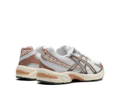 ASICS Gel 1130 orange - high-performance athletic footwear in Orange with advanced cushioning
