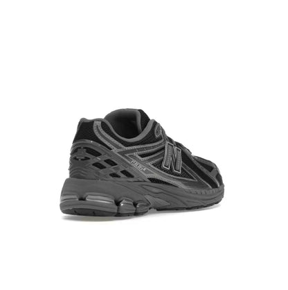 New Balance 1906A Black Grey - high-performance athletic footwear in Black with advanced cushioning